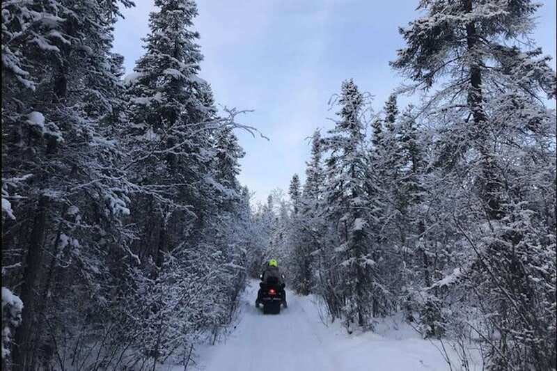 yellowknife-backcountry-snowmobile-tour-with-winter-gear