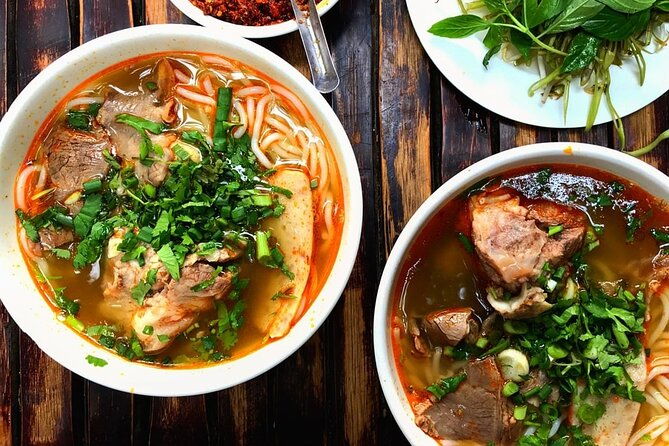 12 Tasting Street Food & Sightseeing By Scooter with Student - Key Points