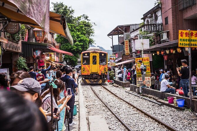 7-Hour Jiufen Night View, Shifen Waterfall & Raohe Market Tour - Transportation and Group Size  