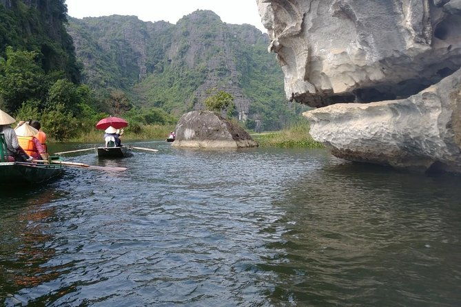 Bai Dinh pagoda & Trang An Grottoes Boating Full Day Trip - Authentic Experiences & Traveler Feedback
