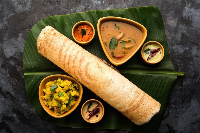 Connaught Place Tour Including Janpath Market and a Dosa at Saravana Bhavan - The Authenticity and Atmosphere