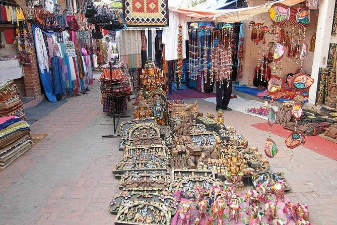 Delhi: Private Half-Day Guided Shopping Tour with Transfer - Authentic Experiences & Insights from Reviews
