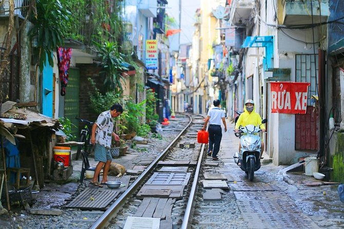 Hanoi city tour and drinking beside railway- group tour - Final Stop and Tour The Sum Up