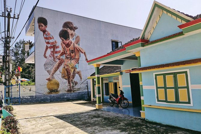 Visiting Tam Thanh mural village - Mother Thu monument - What to Expect From the Tour