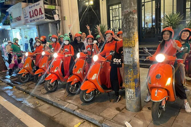 Vespa Female Ao Dai riders Night Street Food + Train Street Tour - The Authenticity and Value of the Experience
