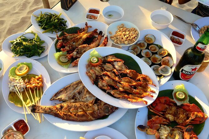 Amazing Ubud and Uluwatu Sunset Tour with Dinner Packages - Uluwatu Temple: Clifftop Majesty at Sunset
