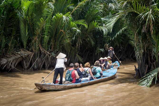Essential Mekong Delta: Highlights Tour from Ho Chi Minh City - Returning to the Hustle of Ho Chi Minh City