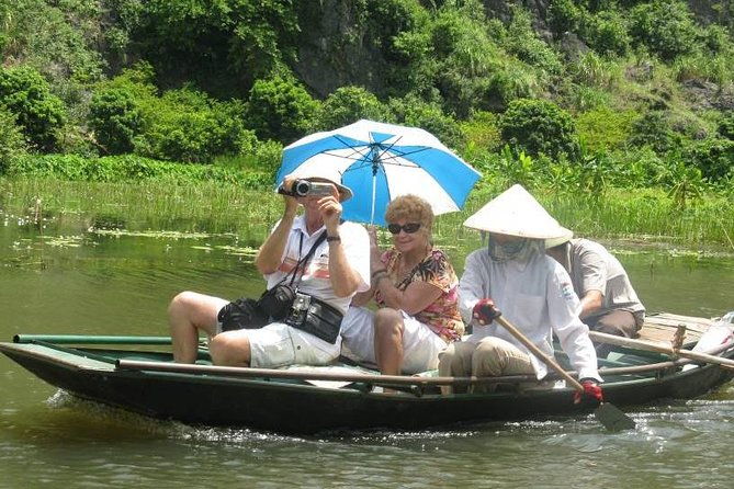 Hoa Lu - Tam Coc - Mua Cave day trip - Luxury limousine from Hanoi - Climbing Mua Cave for Panoramic Views