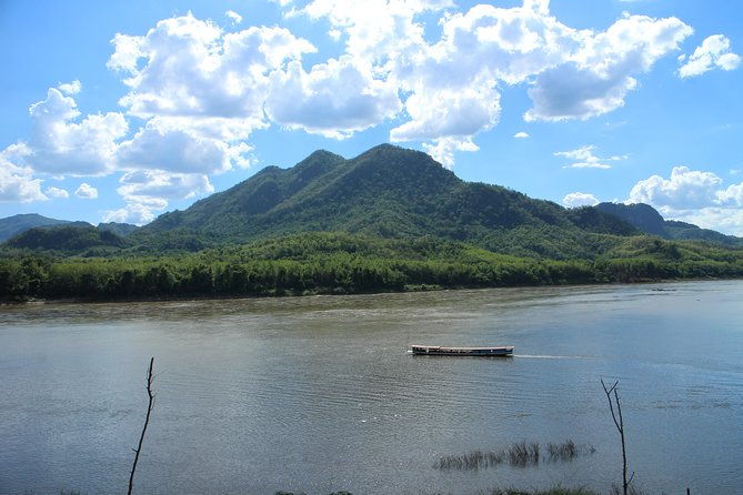 Luang Prabang: Mekong Cruise to Caves, Waterfalls and Villages - Kuang Si Falls: Natural Wonder and Elephant Care
