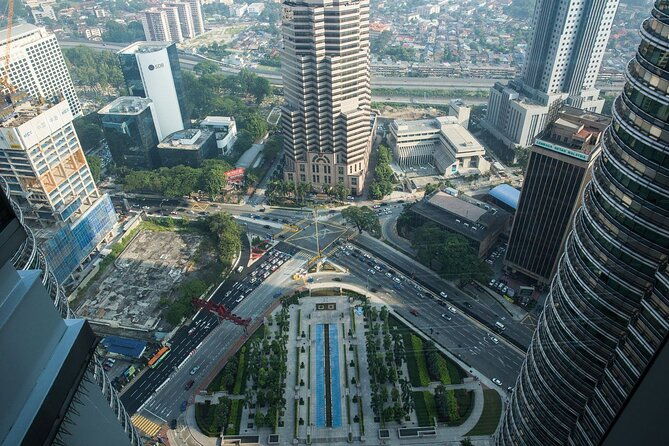 Petronas Twin Tower Skybridge View & Dining Experience Tour with Local Host - Who Should Consider This Tour?