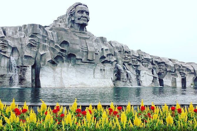 Visiting Tam Thanh mural village - Mother Thu monument - The Sum Up
