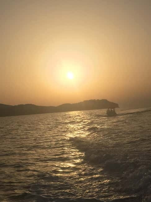 Agia Pelagia: Sunset Motorboat Tour with Soft Drinks - Detailed Breakdown of the Itinerary