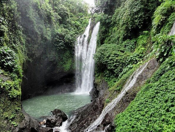 All Inclusive : Jumping Sliding at Aling- Aling Waterfall - Handara Gate - Lunch - Exploring Bali’s Waterfalls and Iconic Sights: A Complete Review of the All-Inclusive Jumping and Sliding Tour