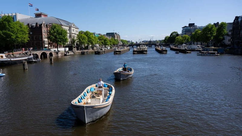 Amsterdam: Canal Cruise in Open Boat with Drink Option - What Reviewers Love Most