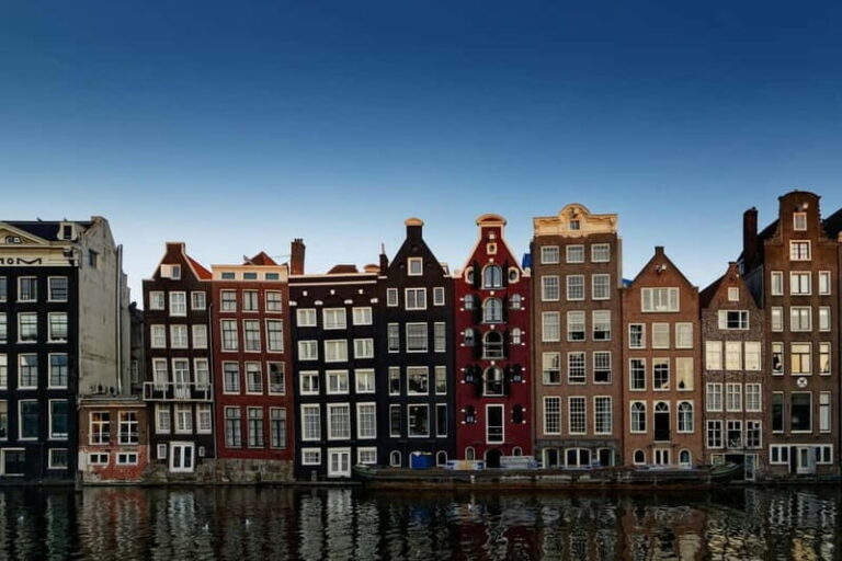 Amsterdam: Iconic Canals & Historic Sights Walking Tour - What Makes This Tour Stand Out?