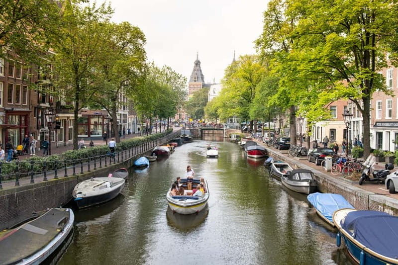 Amsterdam: Open Boat Tour of Canals with Expert Local Guide - Who Will Love This Tour?