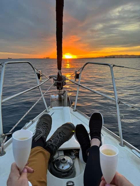 Barcelona: Sunset Sailboat Cruise with Open Bar and Snacks