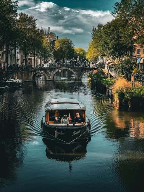 Boat trip through the canals of Amsterdam with Spanish guide - Why This Tour Works for You