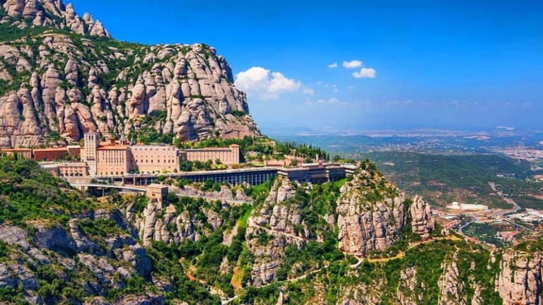 From Barcelona: Montserrat Full-Day Guided Tour - Transportation, Duration, and Group Size