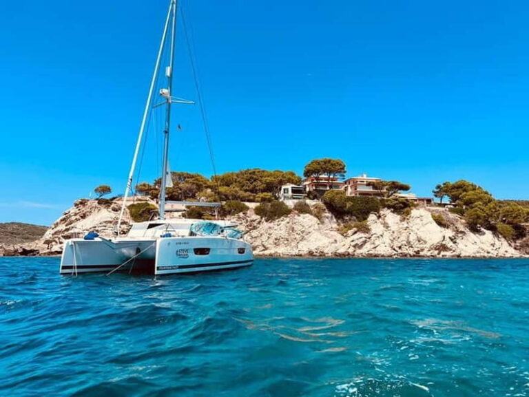 From Palma: Luxury Catamaran Group Tour with Tapas & Drinks - The Atmosphere and Crew