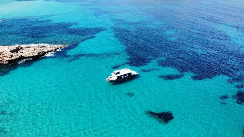 Ibiza: Sunset VIP Paella Cruise with drinks,Paddle Boarding - Water Activities and Onboard Comfort