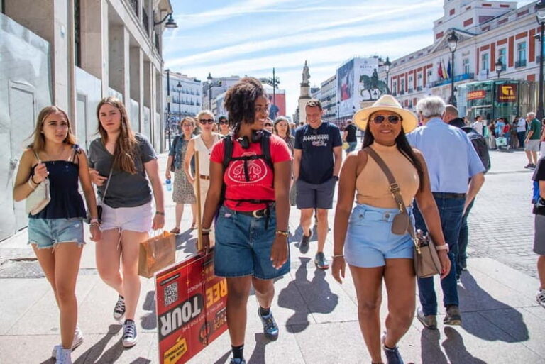 Madrid Essential Walking Tour with Churros, Drink & Market - The Experience in Detail