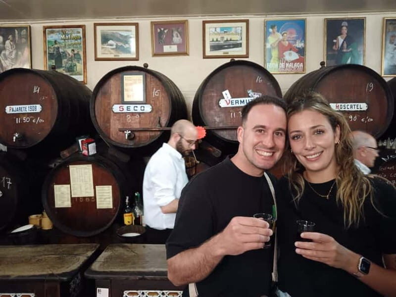 Malaga: Walking Tour with Tapas and Wine Tasting - Exploring Malaga’s Landmark Highlights