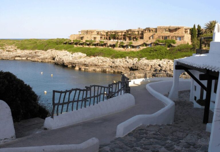Menorca: E-Bike Tour From Punta Prima to Binibeca - Exploring Binibeca: Charm and Beach Breaks