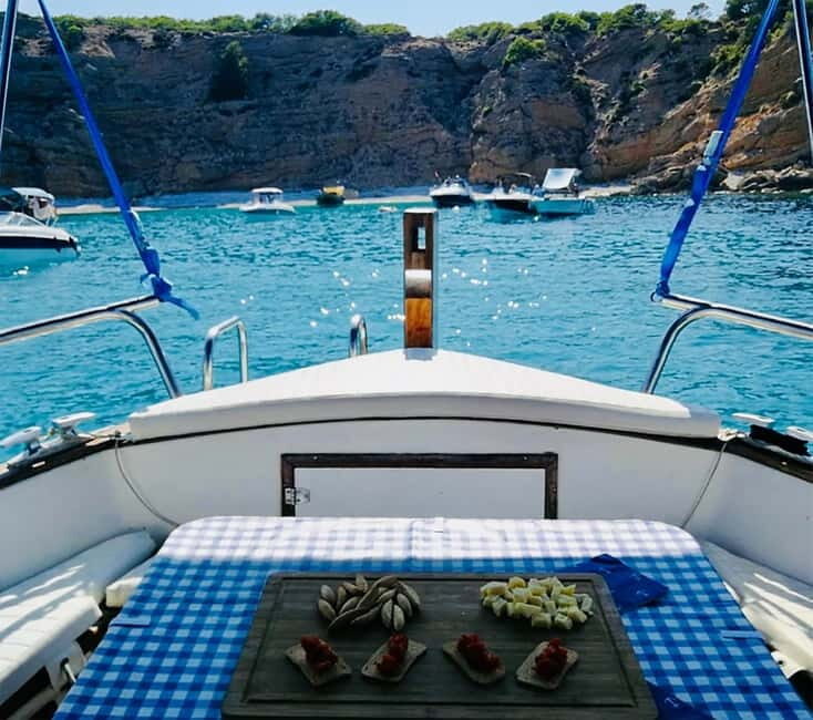 Menorca: Llaut Boat Cruise with Local Appetizers - Water Activities: Swimming, Snorkeling, and Paddleboarding