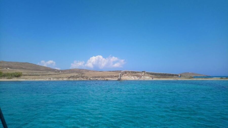 Mykonos: Private Rhenia Sailing Cruise with Lunch & Drinks - The Arrival at Rhenia: Quiet Beaches and Crystal Waters