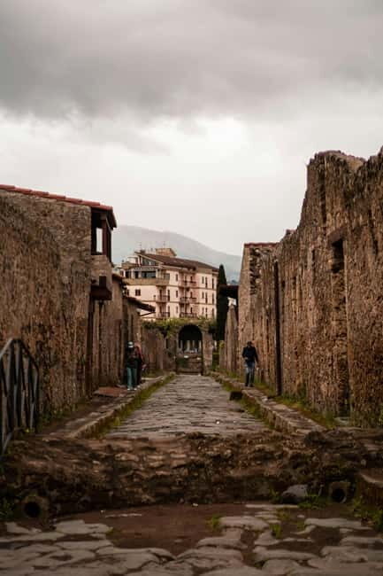 Naples: Pompeii & Herculaneum Shared Regular Group Tour - Pompeii: Walking Through a Lost World