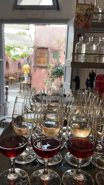Oia: Wine Tasting with Cold Cuts or Cured Fish