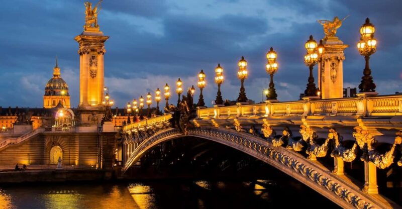 Paris: Illuminated Walking Tour | The Abroad Guide
