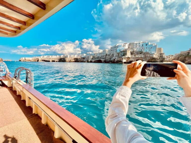 Polignano Monopoli: boat tour on a traditional wooden boat at sunset - What Sets This Tour Apart?