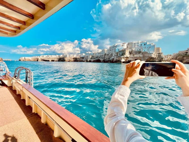 Polignano Monopoli: boat tour on a traditional wooden boat at sunset - What Sets This Tour Apart?