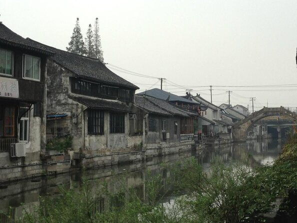 Private Fengjing and Xitang Water Town Sunset Boating Tour with Dinner from Shanghai - Exploring the Charm of Fengjing and Xitang: A Private Water Town Tour from Shanghai