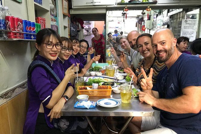 Private Ho Chi Minh Street Food Tour by Motorbike with Ao Dai Female Rider - Discover Ho Chi Minh City Through Its Flavors and Streets