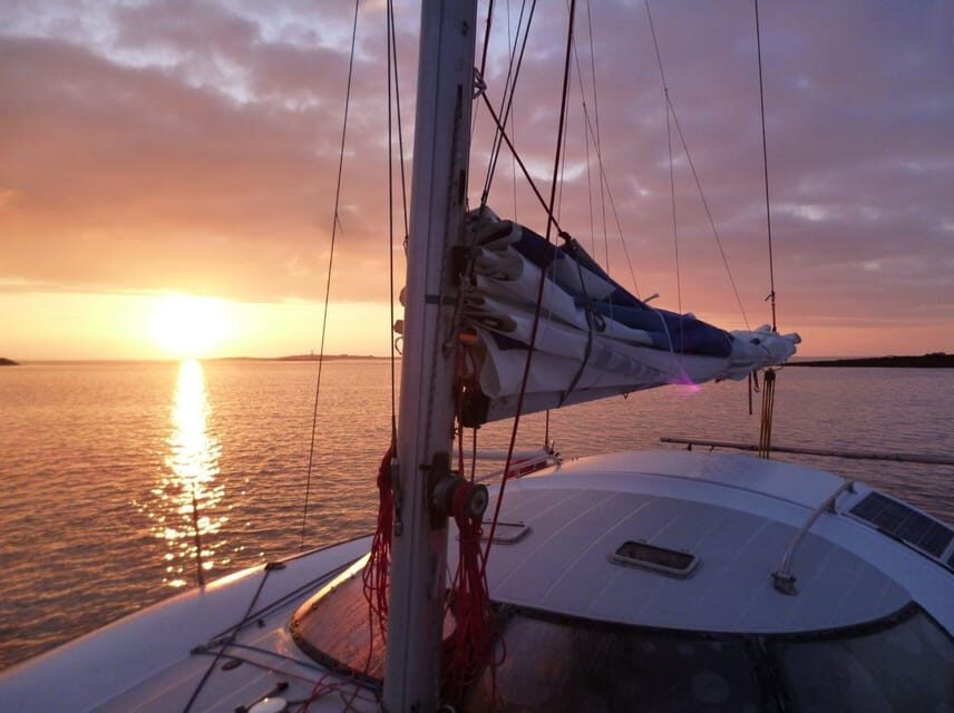 Santorini:Catamaran: private cruise with food & drinks - Who Should Consider This Tour?