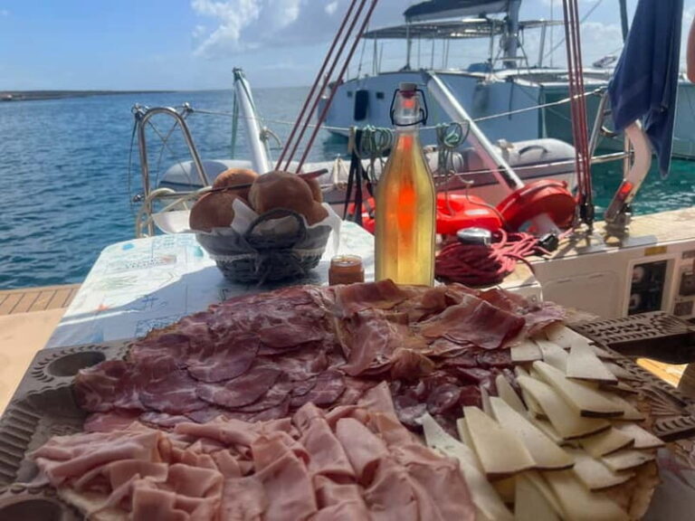 Stintino: full day tour catamaran Asinara Island - Detailed Itinerary Breakdown