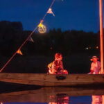 Toru: Toru at Night from a Boat on the Vistula - The Experience’s Value