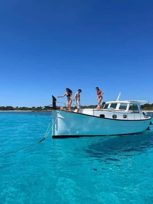 Traditional boat 10 beaches in the south of Menorca. Snorkeling, SUP and drinks - What to Expect on the Day