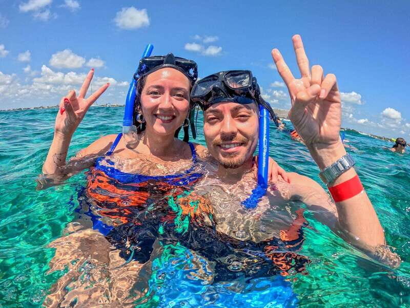 #1 Private Catamaran to Isla Mujeres: Snorkeling & Open Bar! - What Makes This Tour Stand Out