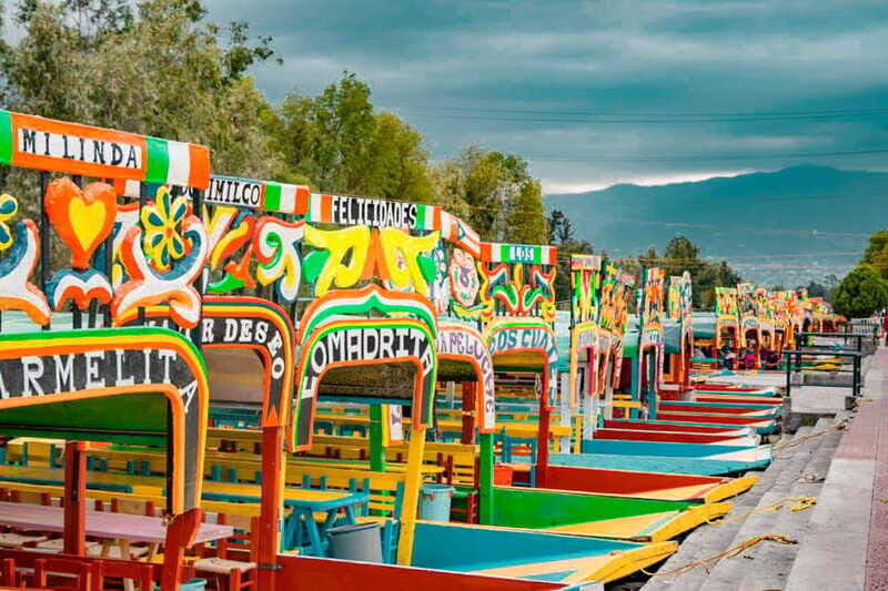 Coyoacán & Xochimilco: Discover an oasis in Mexico City - Floating Through Xochimilco: A Kaleidoscope of Colors