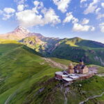 Explore Ananuri, Gudauri, & Kazbegi Guided Day Tour - Transportation and Guide Experience