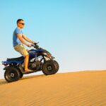 Abu Dhabi Evening Desert Safari - Private car Dune bashing & BBQ - Transition from City to Desert: The Scenic Drive