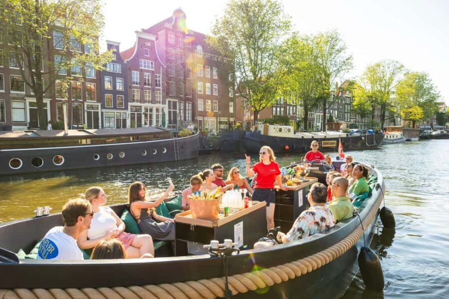 Amsterdam: Guided Open Boat Cruise Unlimited Drinks Option - Who Should Take This Tour?
