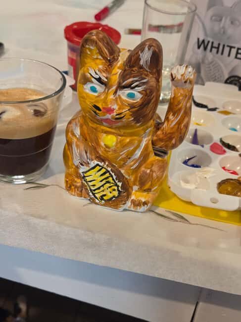 Athens: Paint Your Own Maneki Neko at Cat Cafe - The Atmosphere and Setting