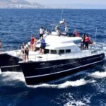 Benalmádena: Private Catamaran Charter for up to 12 People - Swimming, Sunbathing, and Relaxation