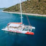 Bol: Catamaran Cruise with Lunch, Drinks, and Swim Stops - Transportation & Group Size