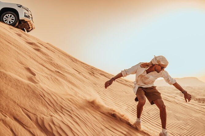 Deluxe Sunset Desert Safari: SandSurfing, Camel Ride & BBQ dinner - An In-Depth Look at the Experience